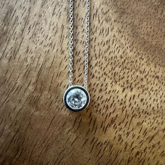 Angara Bezel-Set Round 3/4 Ct. Diamond Solitaire Pendant on 14K White Gold Chain - Picture 4 of 10